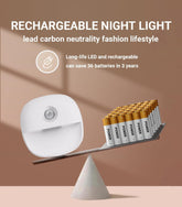 Rechargeable night light with batteries on a balance scale against a brown background
